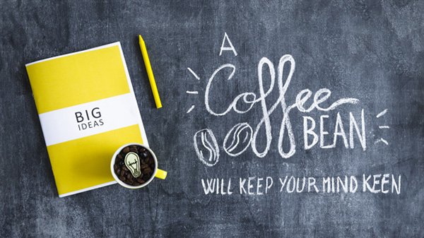 Blackboard with Book Mug and Coffee Beans - Free Photo